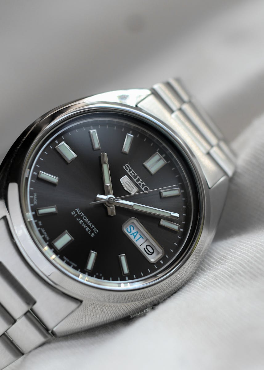 Close-up of a sleek Seiko automatic watch, showcasing its detailed craftsmanship.